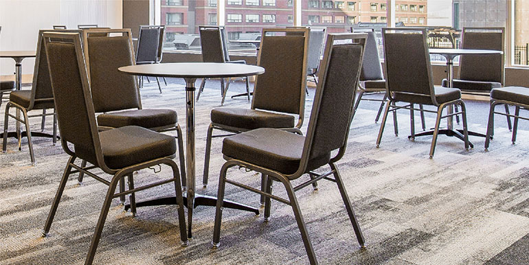 chairs and tables in room