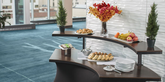 Brunch Food Laid Out On Linenless Table