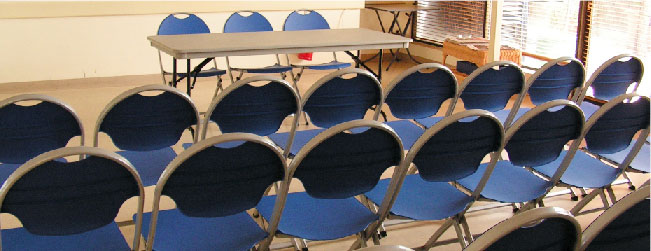 Many Folding Chairs in Rows