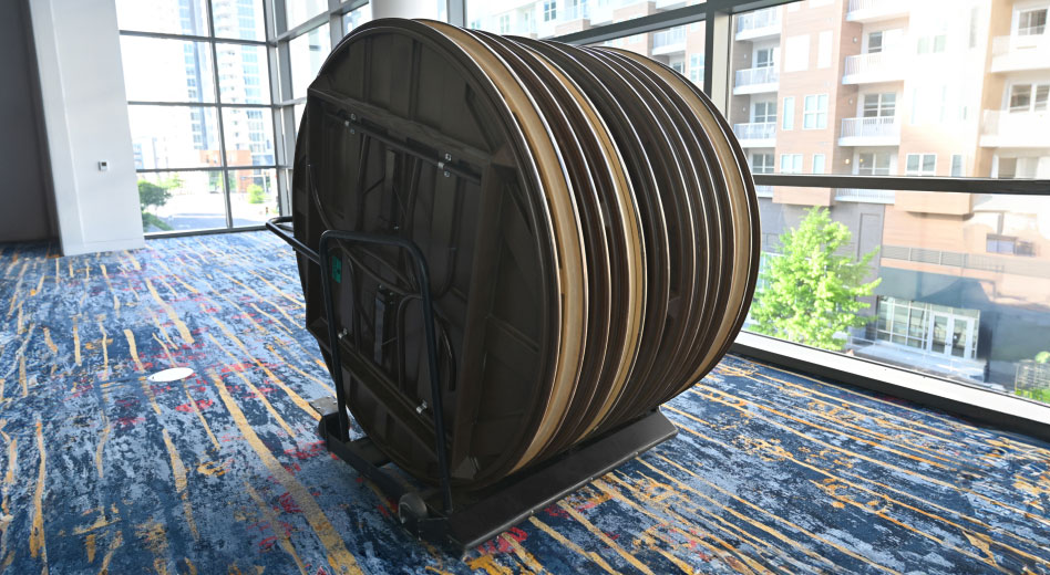 Round Banquet Tables Folded Up On Table Cart