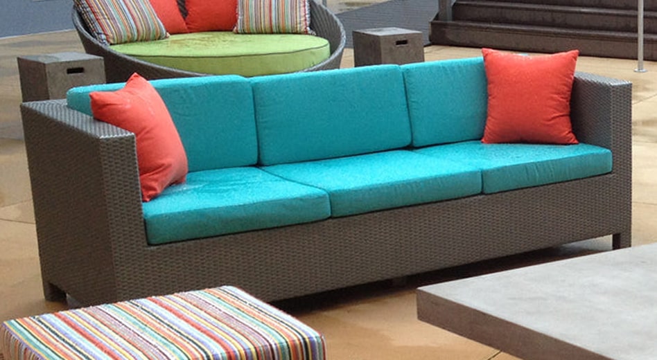 Birch outdoor furniture with vibrant cushions