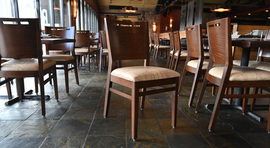 Attractive wooden chairs in a restaurant with natural light