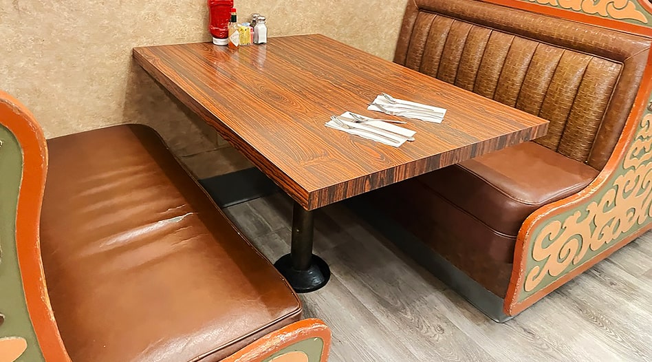 Restaurant booth with cracked vinyl seat