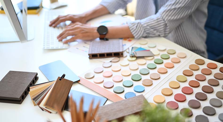 Designer evaluating samples and swatches
