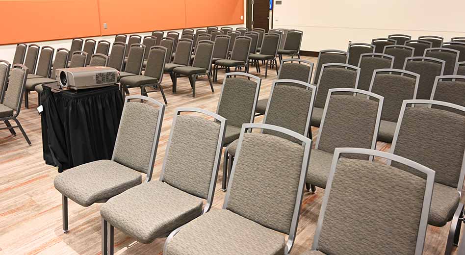 Banquet chairs lined up for a presentation